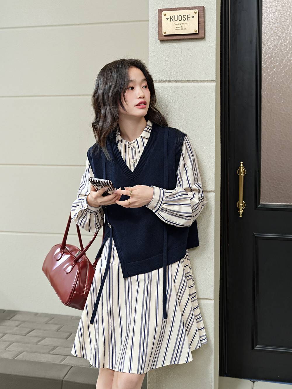 Vest and Striped Dress